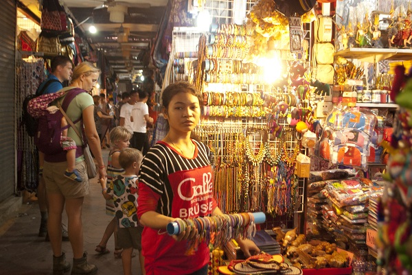 Stall attendant at Psah Chas, Siem Reap, Cambodia